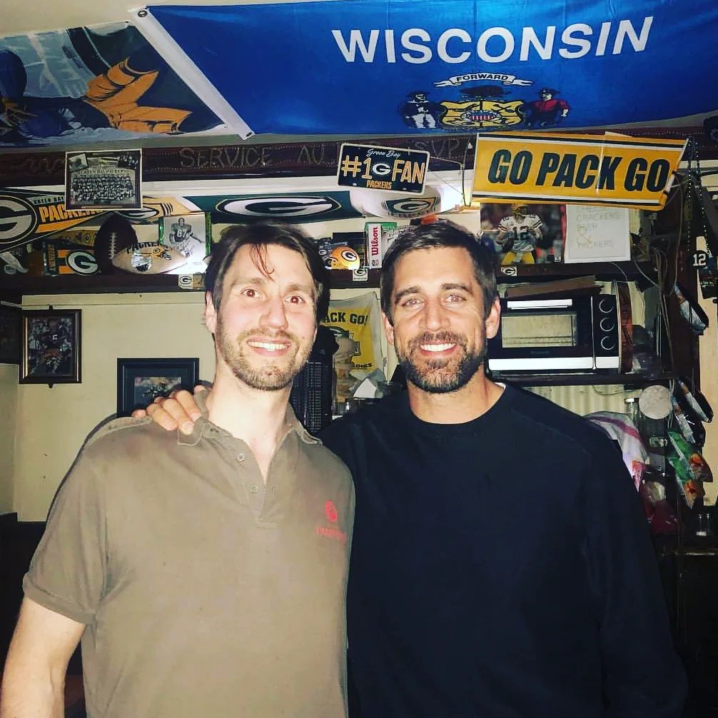 Aaron Rodgers with the WOS Bar owner in Paris